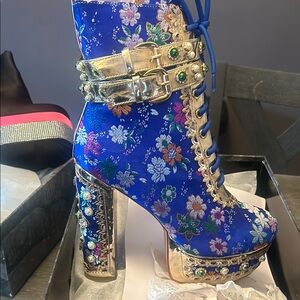 Vibrant Blue and Gold Heeled Boots with Lace-Up Design